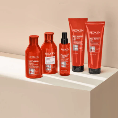 Redken Frizz Dismiss Rebel Tame Heat Protective Leave-In Cream 250 ml. - Image 2